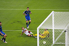 Götze kicks the match winning goal.jpg