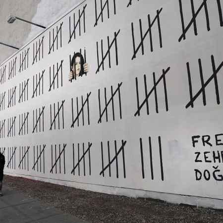 Street artist Banksy struck New York twice in one day with his famed street art, with his latest work showcased along a wall on Houston Street in Manhattan on Mar. 15, 2018 and seen here the following day. The mural draws attention to the jailed Turkish artist Zehra Dogan, who is currently serving out a nearly three year prison sentence for a painting of the war-torn Turkish town Nusaybin. Her painting was considered terrorist propaganda.