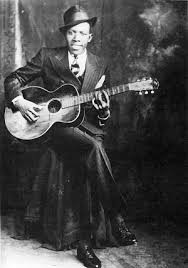ROBERT JOHNSON circa 1930   ‘… poor Bob is sinkin’ down’ 