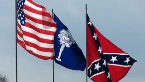 Three flags of South Carolina U.S.A. - State – Confederacy Proudly unfurled atop the capital dome