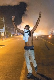 A protester at a demonstration against the killing of Michael Brown, Ferguson, ­Missouri, August 2014