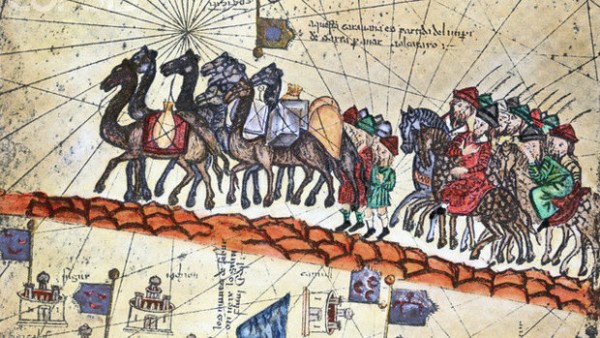 A medieval painting showing the 13th-century caravan of Niccolo Polo (father of Marco Polo) and Maffeo Polo (uncle of Marco Polo) crossing Asia. Detail of the Carta Catalana (1375). --- Image by © Bettmann/CORBIS