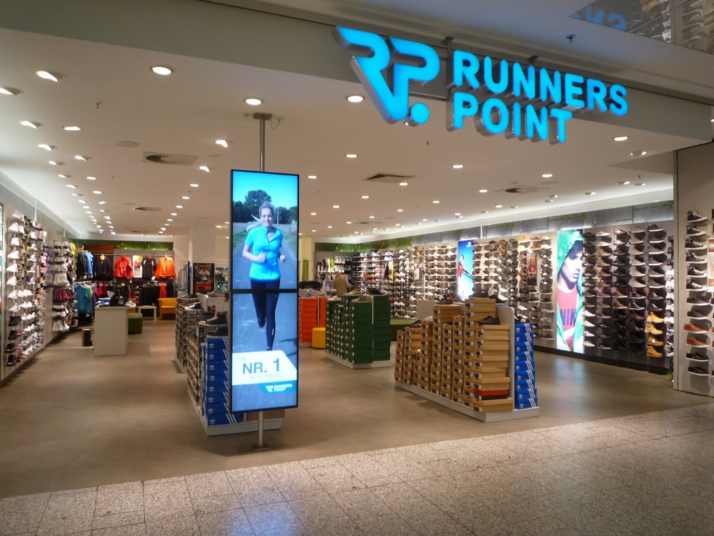 Runners Point setzt auf Digital Signage