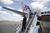 American Airlines flight attendant exiting aircraft. REUTERS Darrel Byers