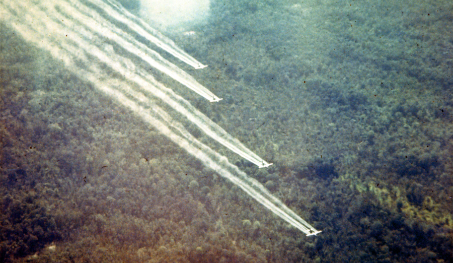 Four-ship formation on a defoliation spray run. (U.S. Air Force photo)