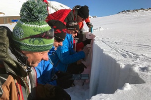 Avalanche observers learn how to check the profile of the snowpack