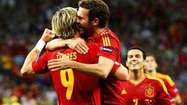 Spain beats Italy, 4-0, to repeat as European champions