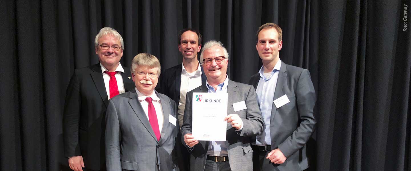 Gruppe der Gewinner mit Rektor Freimuth und Kanzler Stückradt