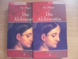 Die Alchimistin im Schuber Club-Taschenbuch