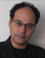 Jamal Mahjoub is an award winning writer of mixed British/Sudanese heritage. Born in London, he was raised in Khartoum where the family remained until 1990. He was awarded a scholarship to study in England and attended university in Sheffield. He has lived in a number of places, including the UK, Denmark and currently, Spain. In 2012, Mahjoub began writing a series of crime fiction novels under the pseudonym Parker Bilal.
 
Jamal Mahjoub wurde 1960 in London geboren. Die Familie wohnte einige Jahre in Liverpool, bevor sie in den Sudan übersiedelte, die Heimat des Vaters. Dort verbrachte Mahjoub seine Schulzeit am Comboni College, das von italienischen Priestern geleitet wird. Später erhielt er ein Stipendium für das Atlantic College in Wales und studierte danach in Sheffield Geologie. Schon während seines Studiums veröffentlichte er literarische Texte in Zeitschriften. Nach vielen Ortswechseln lebt er heute in Barcelona. Jamal Mahjoub hat bereits mehrere Romane veröffentlicht. Parker Bilal ist das Pseudonym, unter dem er als Kriminalautor schreibt.

Participant of the European Literature Days 2015.
Teilnehmer der Europäischen Literaturtage 2015.